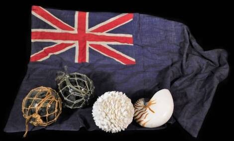 Various shells, a shell orb, glass casts 13cm diameter, naval linen ensign flag, etc. (a quantity)