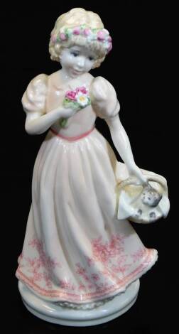 A Coalport Barnardo's Compton and Woodhouse figure A Christmas kitten, limited edition no.1054/5000, printed marks beneath, 18cm high. (in associated box)