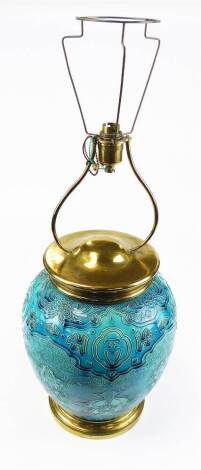 An early 20thC Burmantofts pottery Faience Chinese pattern lamp vase, in turquoise with brass mounts, impressed marks beneath, 72cm high.