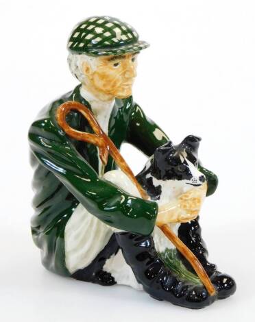 A V Firth Isle of Man shepherd and collie group, marked beneath, 12cm high.