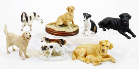 A Border Fine Arts figure of a labrador, on a naturalistic base and wooden plinth, 14cm high, further dog ornaments, Border Fine Arts style, etc. (a quantity)