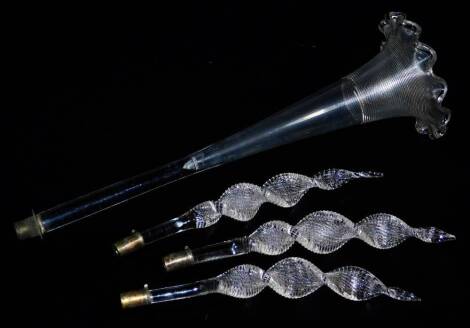 Three plain glass barley twist sugar cane type epergne sections, and a central trumpet, 37cm high. (4)