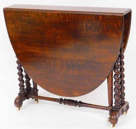 A late 19thC oak Sutherland table, the D end top raised on barley twist legs terminating in scroll feet with carved roundels and pot castors, when closed 75cm high, 85cm wide, 16cm deep.