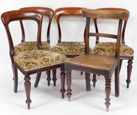 A set of four Victorian mahogany balloon back chairs, each with overstuffed seats on turned front legs, 93cm high and a further chair. (5)