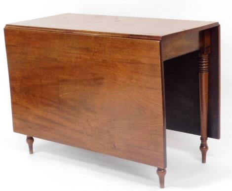 A 19thC mahogany drop leaf table, on turned ring turned legs, when closed 75cm high, 101cm wide, 50cm deep.