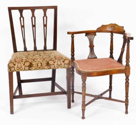 An Edwardian mahogany corner chair, with shaped overstuffed seat on turned legs joined by an X stretcher, 72cm high and a further 19thC chair. (2)