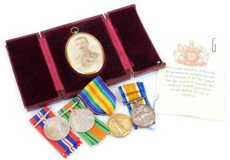 A World War I medal duo, campaign and victory medals, similarly marked 775787 DVR F Hunter RA and 776787 DVR F Hunter RA, two World War II medals defence war medals unmarked but in envelope bearing name M Hunter ware decorations, Corporal RAF no.1525357, 