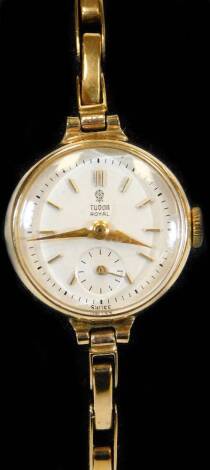 A 9ct gold Rolex Tudor Royal cocktail watch, with baton pointers and numerals, 1.5cm diameter dial and an elasticated bracelet marked 375, 12.3g all in.