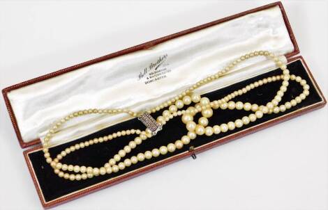 A multi strand pearl necklace, the clasp marked 925, of graduated form, 21cm wide, in Bell Brothers box.