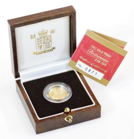 A Britannia 1/10oz proof gold coin, in case and box with paperwork.