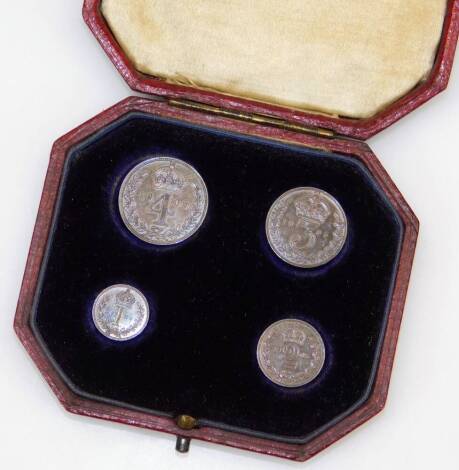 An Edwardian cased set of Maundy money, dated 1905, four pence, three pence, 4d, 3d, 2d and 1d, in Moroccan leather gilt stencilled case.