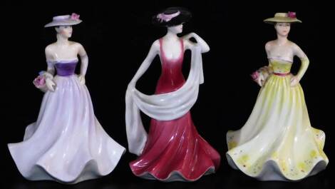 A Coalport figure Kerry, 14cm high, Loretta and Poppy, printed marks beneath. (3)