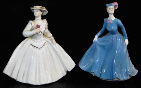 A Coalport figure Emma Louise, 14cm high, and Ann, printed marks beneath. (2)