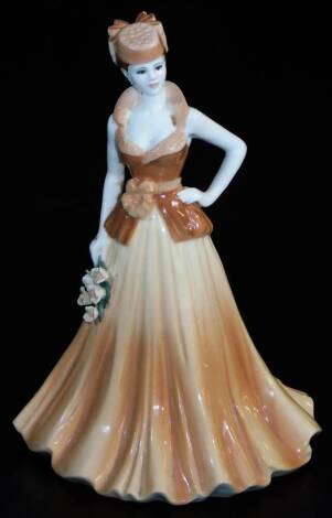 A Coalport Ladies Of Fashion figure Yvonne, printed marks beneath, 24cm high.