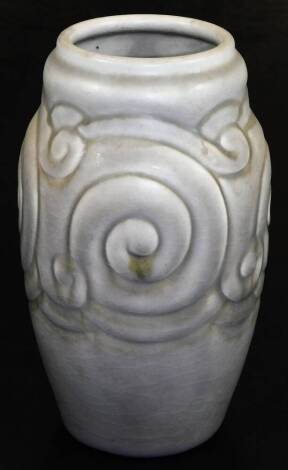 A 20thC pottery Royal Lancastrian pottery vase, in grey with a swirl pattern, impressed marks beneath, 21cm high.