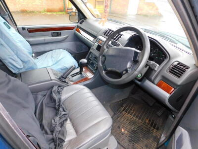 A Range Rover 2.5 DSE, registration J6 DRM, battery flat (first registered 20.8.1998), V5 present, approx 75,823 recorded miles, last service document for 26th April 2000, at 16,115 miles, and a Land Rover owners handbook and documentation, MOT until 29th - 3