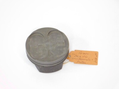 A Mahle Ferrari F1 V10 piston, part no 80P.