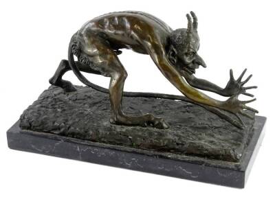 Nino Oliviono. A figure of the devil crouching, on a rectangular base, circular foundry mark, with marble plinth, 31cm wide.