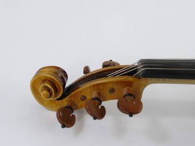 A 20thC violin, with one piece back, length of back 35.5cm and a bow. - 5