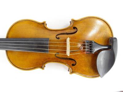 A 20thC violin, with one piece back, length of back 35.5cm and a bow. - 6