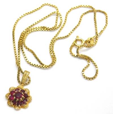 A 9ct gold cluster ruby pendant, and 18ct gold chain, with a central ruby approx 4.5mm, surrounded by eight further rubies approx 2.5mm diameter, all in yellow metal claw setting, possibly Edinburgh 2001, with a Venetian box link chain, with bolt ring fas