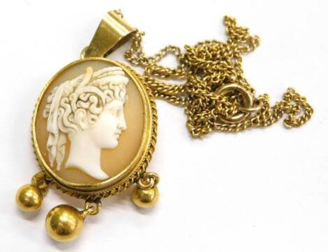 A late 19thC cameo pendant and chain, the oval cameo with figure of a maiden looking right, within rope twist border, with three ball drop design, on a fine link chain, yellow metal, unmarked, 5.2g all in.