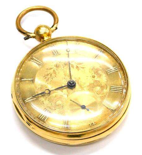 An 18ct gold pocket watch, with large circular gold coloured dial, with flowers and scrolls, with seconds dial and black hands, key wind, the back case with rubbed shield decoration, 93.4g all in, cased. No maker's marker.