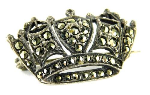 A marquasite set crown brooch, 3cm wide, marked Silver England, 4.8g all in.