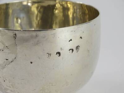 A silver coloured metal plain bowl (AF), marks indistinct, 2¼oz. Provenance: The Estate of Miss Rachel Monson. - 2