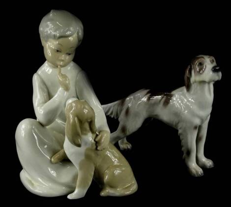 A Lladro porcelain figure of a young girl with a dog, and another Copenhagen porcelain setter (2).