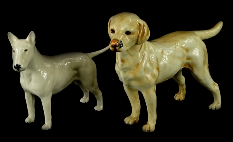 A Goebel ceramic model of a Labrador, no. 1968, and a Beswick bull terrier.