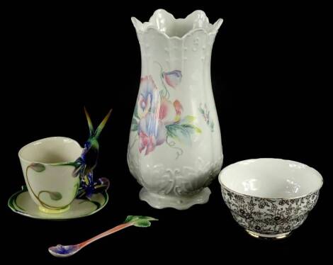 A Franz porcelain cup, saucer and spoon, decorated with humming birds, numbered FZ00129, an Aynsley little sweetheart vase and a Regent porcelain sugar bowl decorated in gilt.