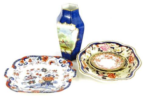 A collection of porcelain, to include a Coalport type vase decorated with birds on a blue ground, stamped underside Staffs, a Masons dish, a Royal Crown Derby saucer, a Royal Worcester side plate, etc.