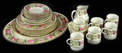 A Royal Garden part coffee service, decorated with bands of roses, etc.