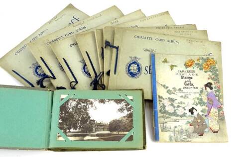 A small postcard album, mainly real photos relating to country house scenes etc., senior service, Britain from the air, cigarette cards, etc. Provenance: The Estate of Miss Rachel Monson.