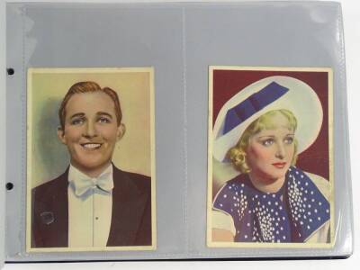 An album of cigarette cards and postcards, to include De Reszke Cigarettes Film Stars, Godrey Phillips Limited Shots from the Films, etc. - 2