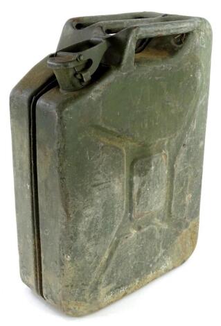 A military issue green petrol can, stamped 1952.