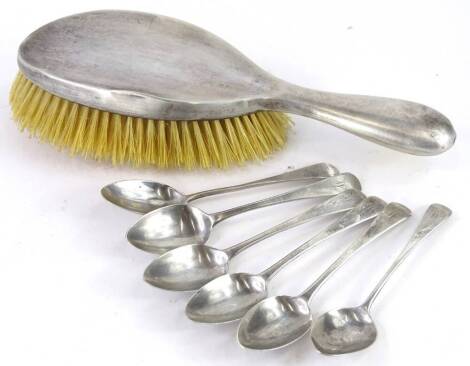 An associated set of six 19thC silver old English pattern teaspoons, 2½oz, and a silver mounted brush, (7).