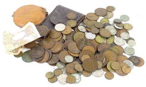 A quantity of British and foreign coins, to include a small number of silver.