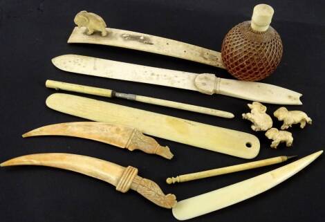 Various 19thC items of ivory, bone etc., to include a cranberry tinted glass flask with ivory lid and basket weave sides, a group of carved bone goats, etc. Provenance: The Estate of Miss Rachel Monson.