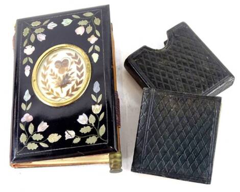 A miniature London Almanac for 1875, in original leather folder and a small papier mache and mother of pearl aid memoir, the cover inlaid with a panel of flowers and leaves (2). Provenance: The Estate of Miss Rachel Monson.