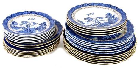 A Booths Old Willow pattern Real blue and white part dinner service, to include dinner plates and side plates, etc.