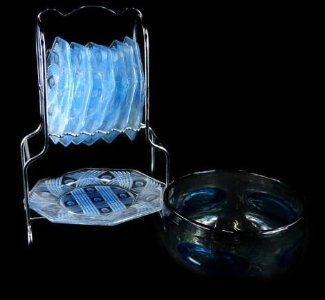 An usual 1950's sandwich set, comprising large sandwich plate and six side plates, housed on a purpose built chrome plated stand and an art glass bowl.