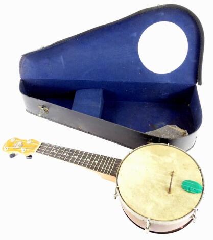 A Dulcetta ukulele banjo, the box stamped John Grey & Sons.