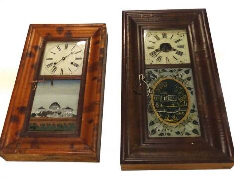 Two American wall clocks, each with a painted dial and verre eglomise panel of a building. (AF)