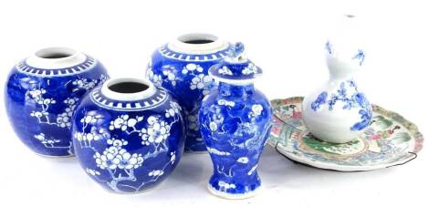 A quantity of oriental porcelain, to include Chinese plate decorated with figures, Japanese double gourd vase and various ginger jar bases, etc.