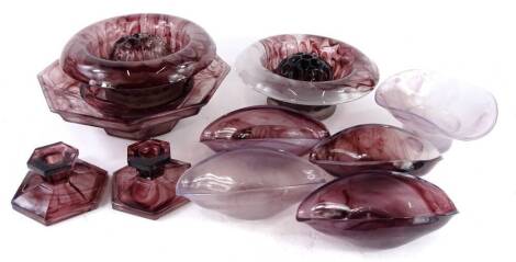 A collection of purple cloud glass, possibly Davidson to include a posy holder, elliptical dishes, etc.