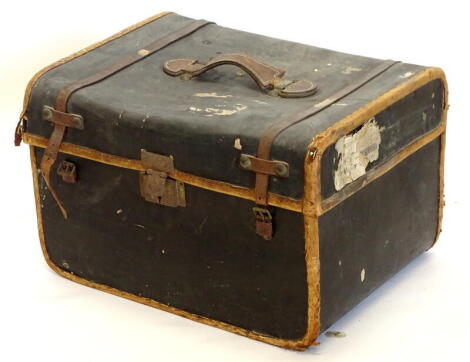 A canvas and leather small trunk, lacking tray to interior, 49cm wide.