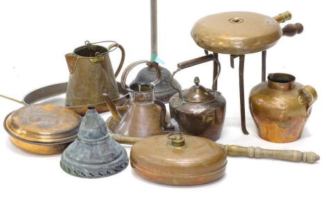 A quantity of metal ware, to include a copper and brass bed warmer, a flat bottom kettle, a trivet, a posher etc.