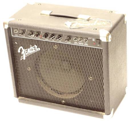 A small Fender guitar amplifier, model Frontman 25R.